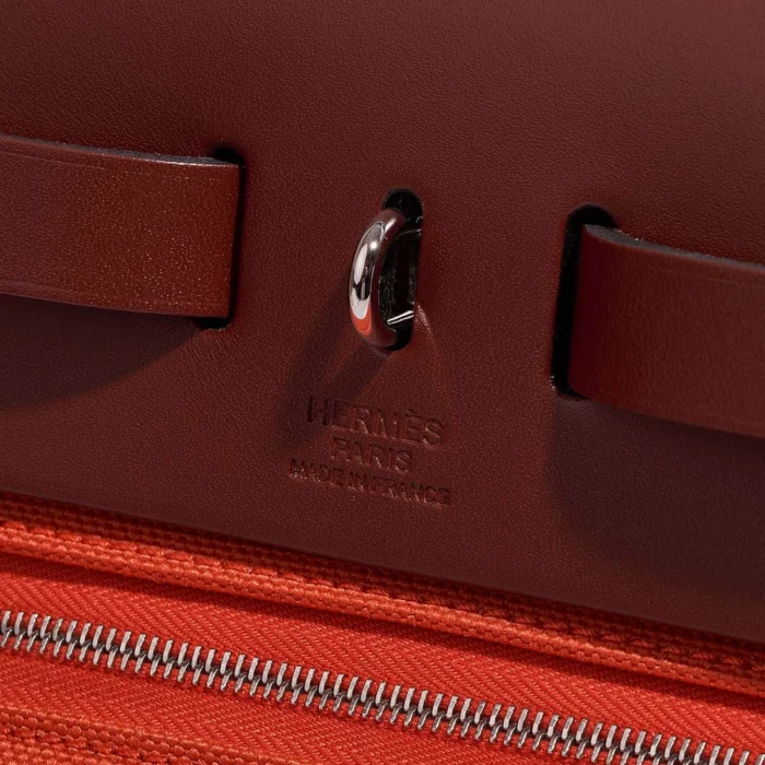 Premium Hermès Replica Herbag 31 Toile/Vache Hunter Orange Mecano/Rouge H PHW - Direct Luxury Fashion - Image 2