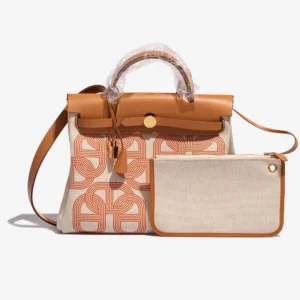Premium Hermès Replica Herbag Circuit 24 31 Toile/Vache Hunter Orange Mecano/Ecru/Beige/Naturel GHW - Direct Luxury Fashion
